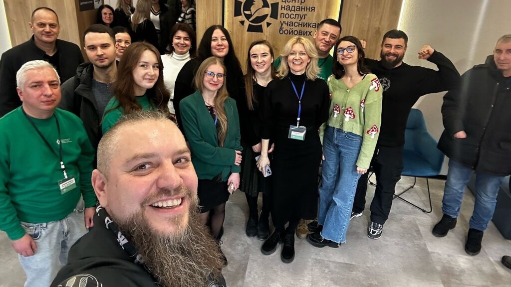 Andriy-with-his-co-workers-in-the-office_1744890958405_hpMain_16x9.jpeg
