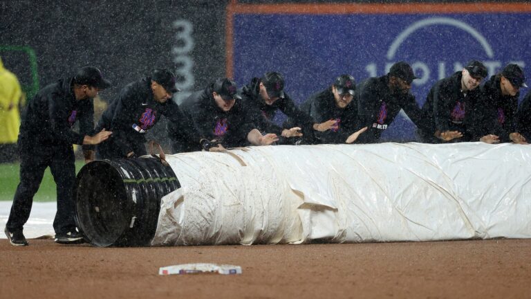 rain-tarp-mets-game-ap-jt-250524_1748100956992_hpMain_16x9.jpg